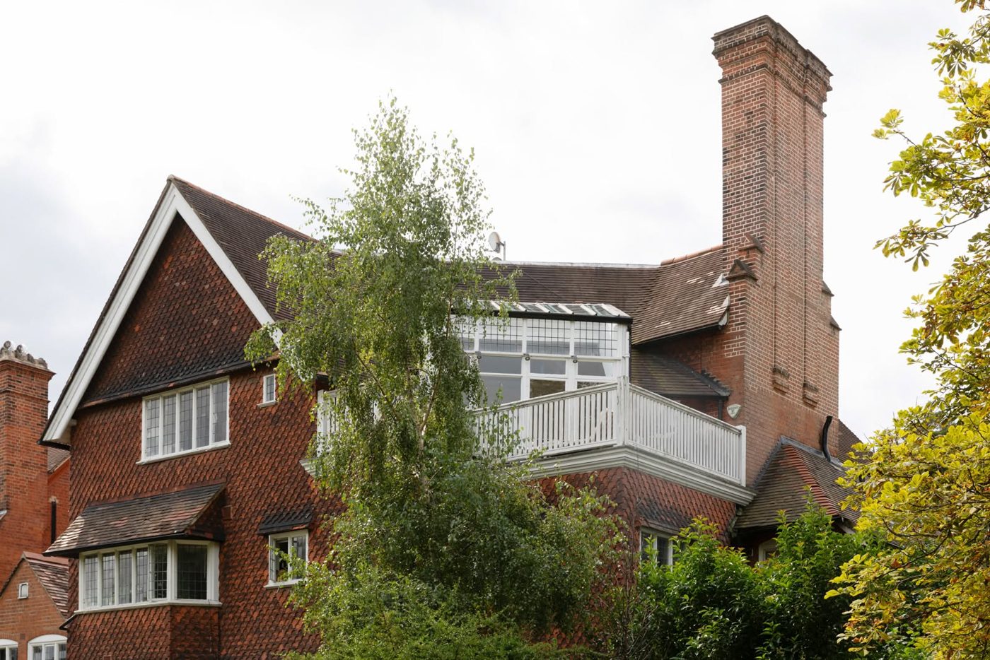 Exterior repaint and restoration of a period red-brick home in Hampstead